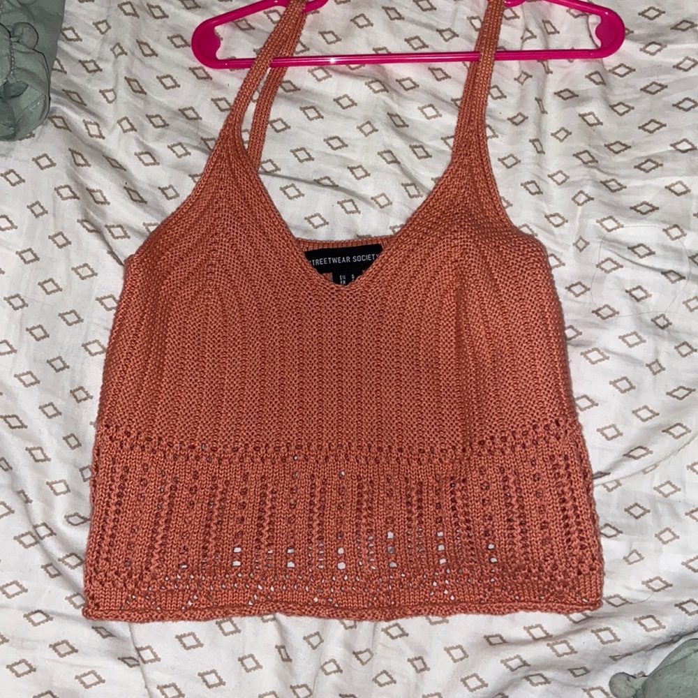 peach knit shirt
